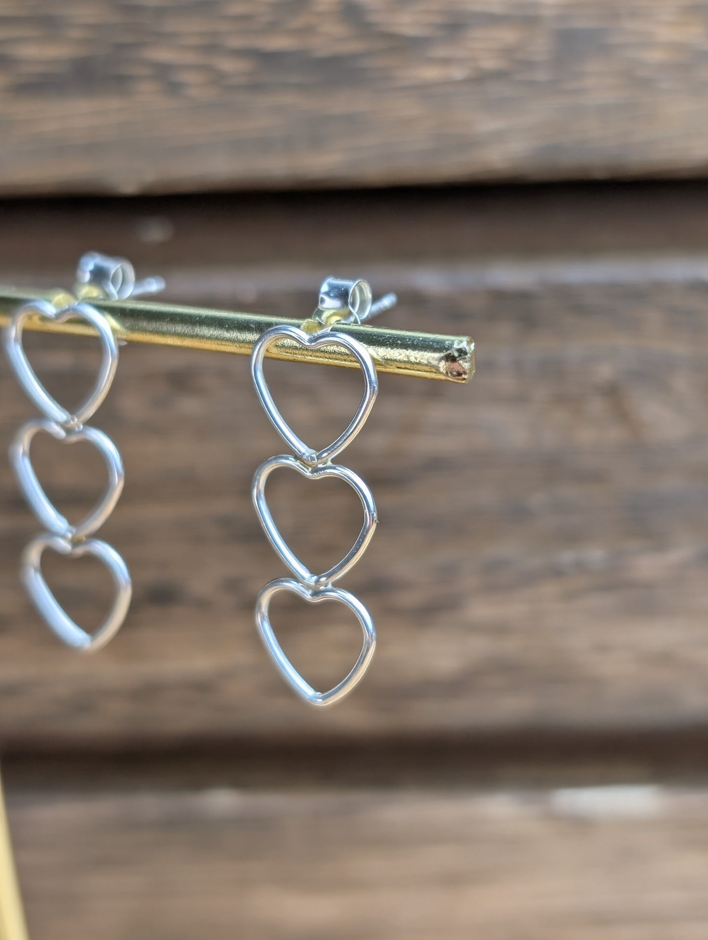 sterling silver triple heart dangle earrings