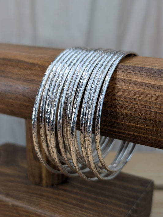 sterling silver curved hammered bangle