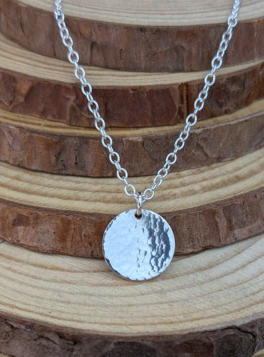 sterling silver hammered disc pendant